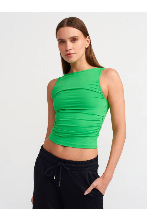 20827 Ruffle Sleeveless Top - Green - 11