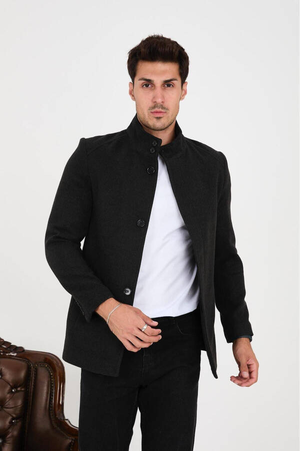 A double-breasted, slim-fit cashmere coat. - 1