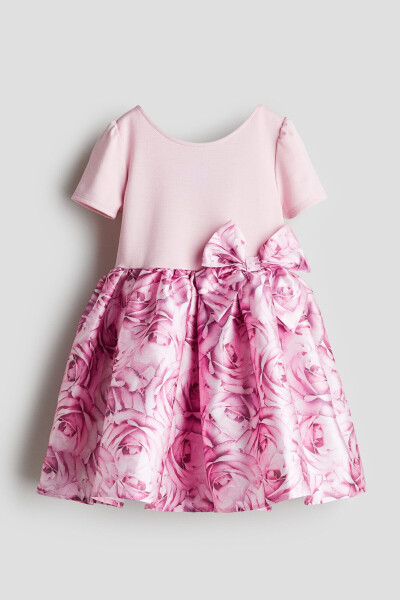 A dress with a short flared skirt. - 1