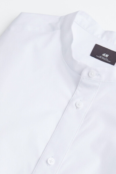 A fitted shirt with a mandarin collar, designed for muscular builds. - 6