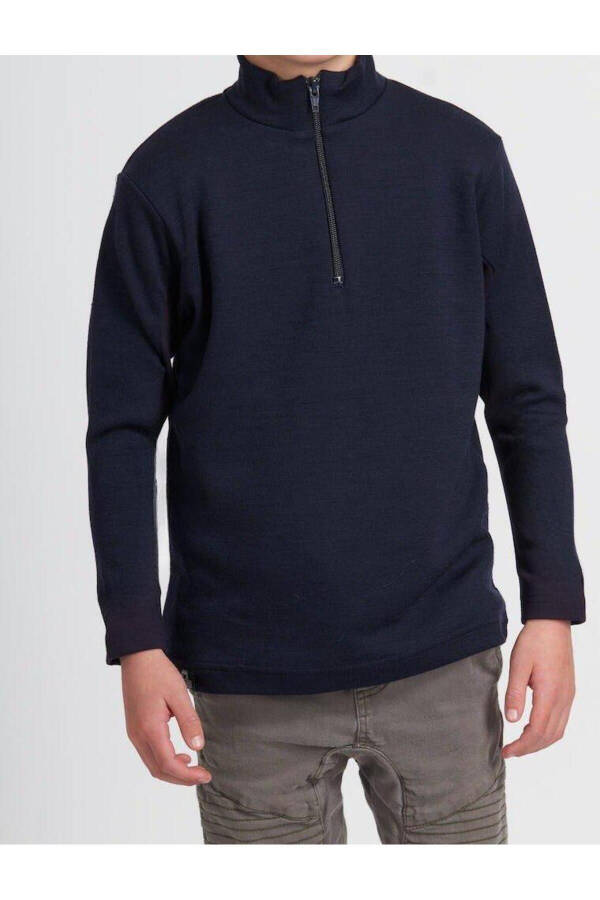 A navy blue, collared, half-zip sweater. - 1