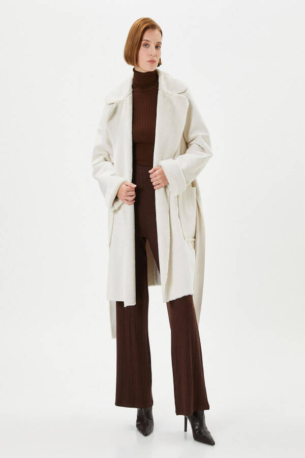 A white woman's coat - 1