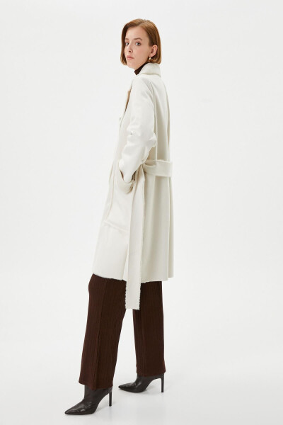 A white woman's coat - 2