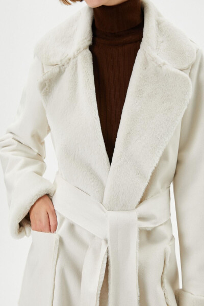 A white woman's coat - 5