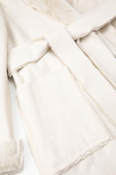 A white woman's coat - 8