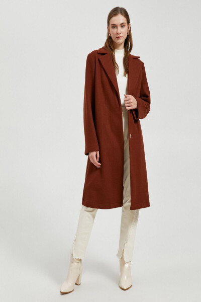 A woman's brown coat. - 1