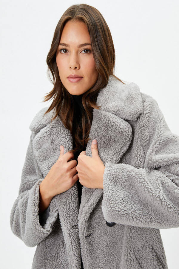 A woman's gray coat - 2