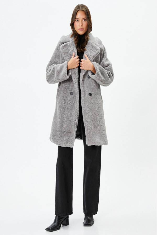 A woman's gray coat - 4