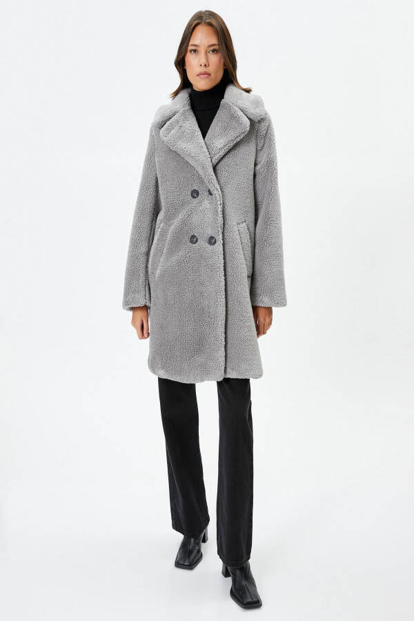 A woman's gray coat - 5