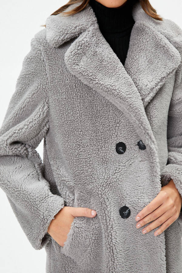 A woman's gray coat - 7