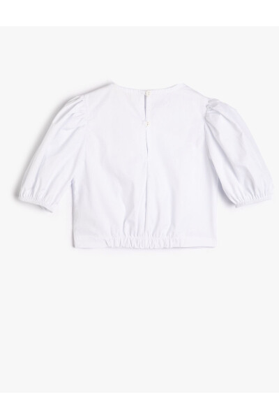 Asymmetric cut, buttoned, short balloon sleeve, cotton crop top. - 1