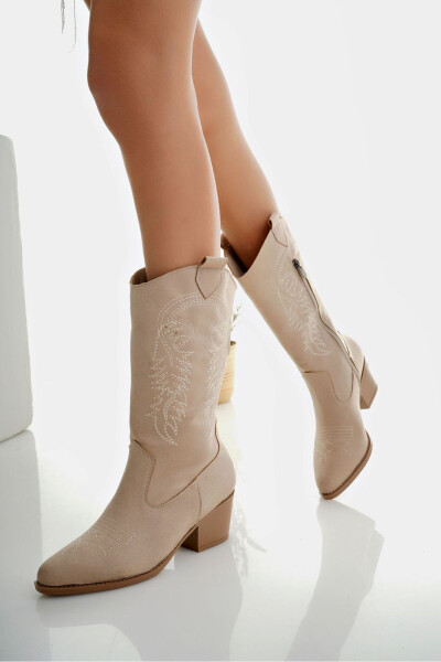 Beige leather, embroidered, zippered cowboy boots. - 1