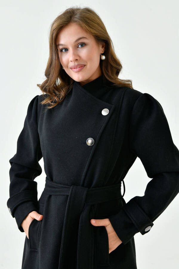 Black cashmere coat, buttoned, lapel collar, belted, lined and long-sleeved. (9003) - 1