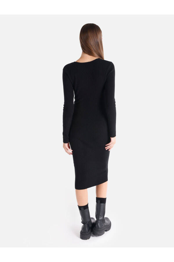 Black midi dress with a V-neck and a fitted silhouette. - 2