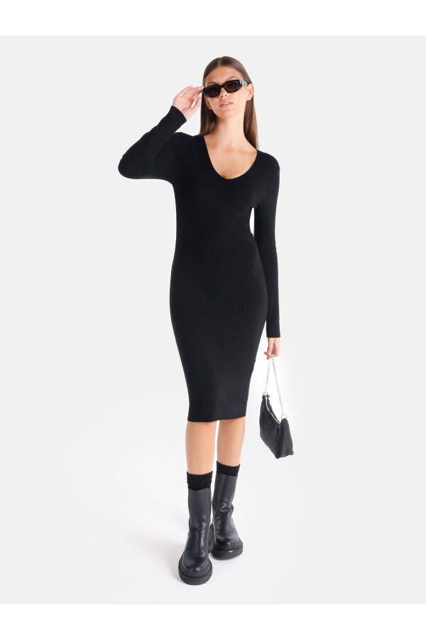 Black midi dress with a V-neck and a fitted silhouette. - 3