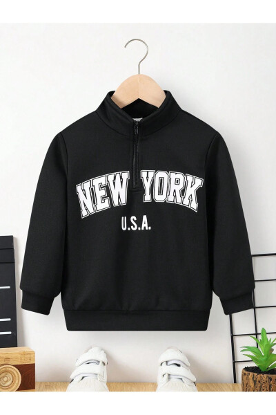 Black New York printed, stand-up collar, half-zip sweater. - 1