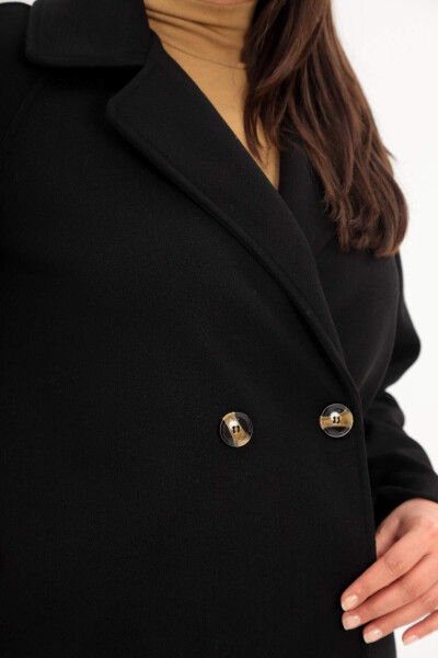 Black oversized coat with button details. - 4