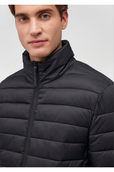 Black puffer jacket, stand-up collar. - 5