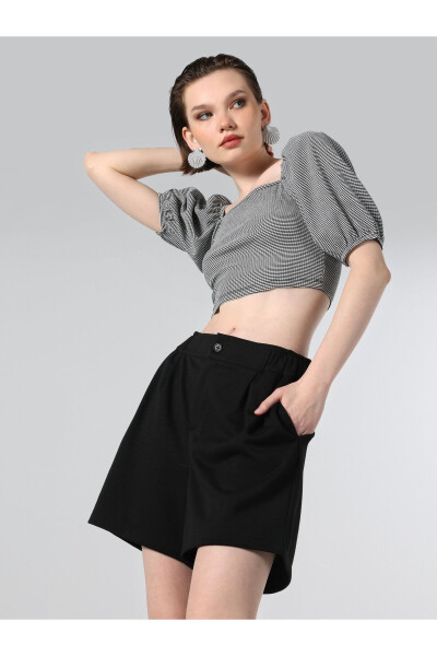 Black, short-sleeved, crop top with a square neckline and print. - 3