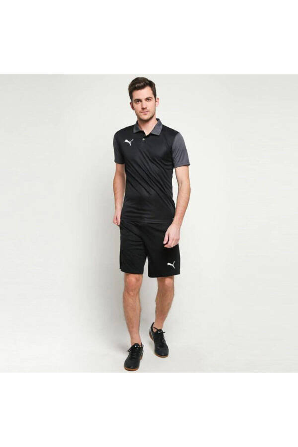 Black Teamgoal 23 Sideline Polo collar T-shirt with Dry-cell technology. - 1