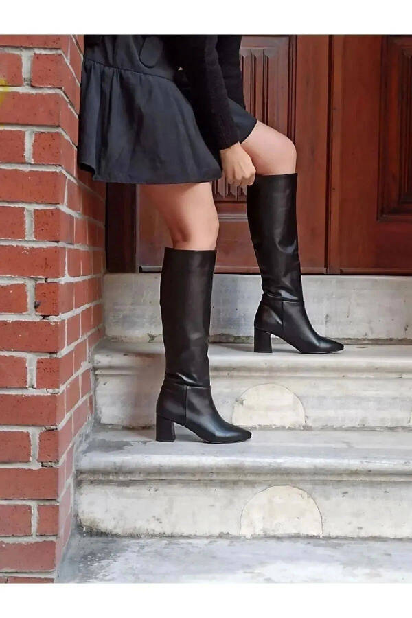 Black zipper knee-high heeled boots. - 4