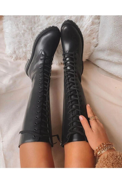 Black, zippered, long boots. - 1