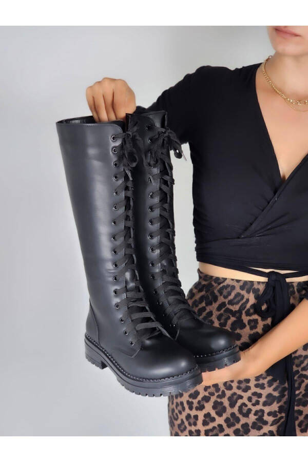 Black, zippered, long boots. - 2