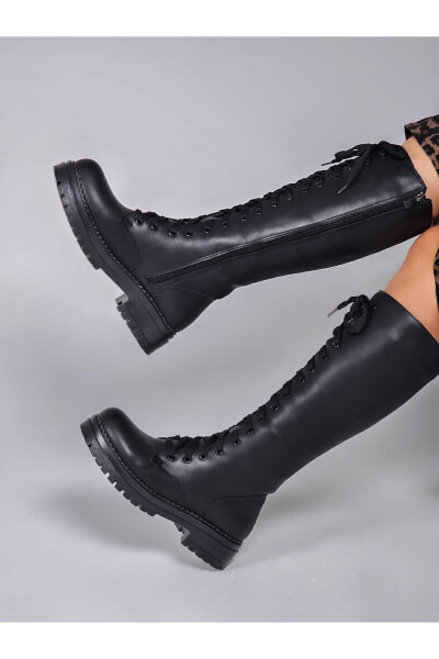 Black, zippered, long boots. - 5