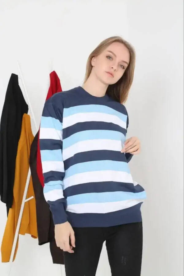 Blue striped crew neck sweater. - 1