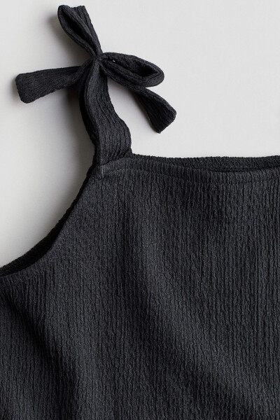 Bow detail and peplum top - 2