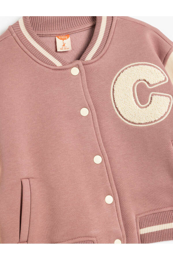 College jacket with fleece lining, applique details, pockets and snap closure. - 3