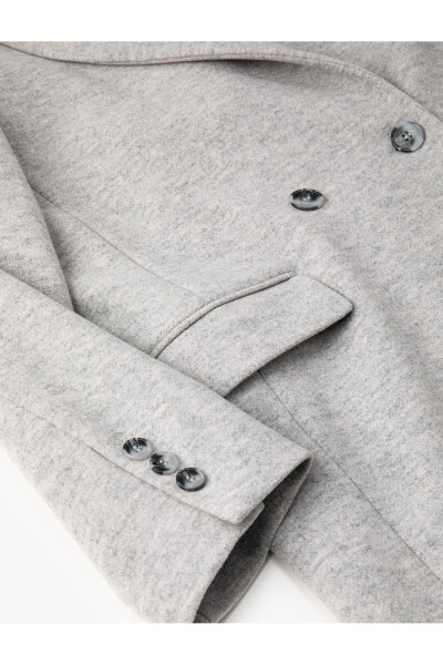 Double-breasted coat with buttoned pocket detail. - 7