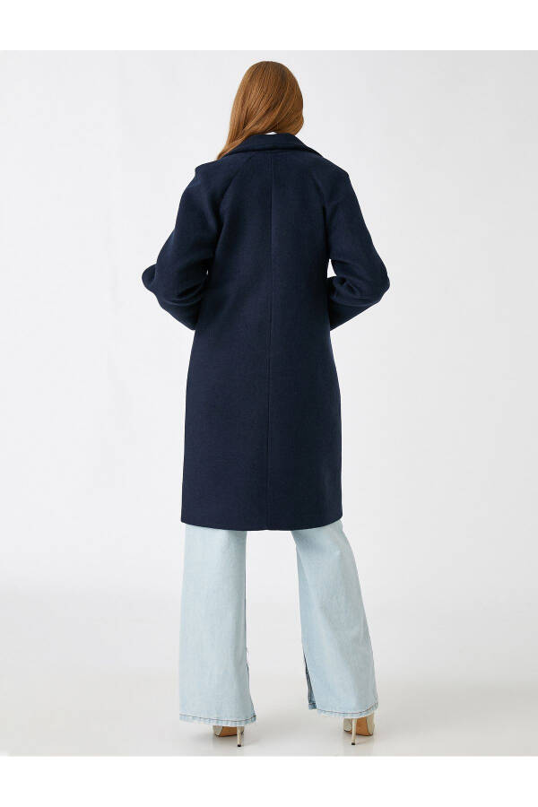 Double-breasted, wool blend coat with pockets. - 4