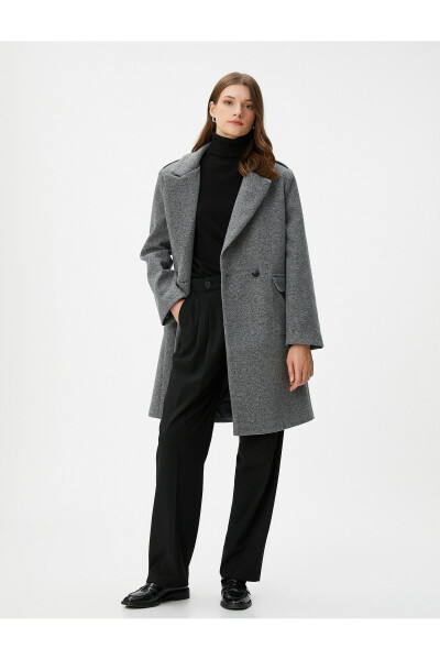 Double-breasted wool coat with buttoned flap pockets. - 7