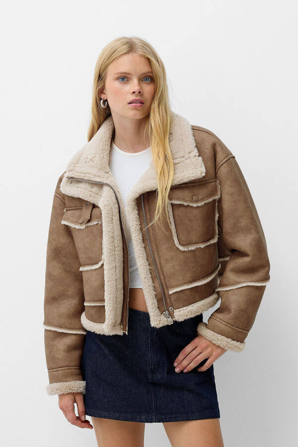 Double-faced faux fur faux leather jacket - 1