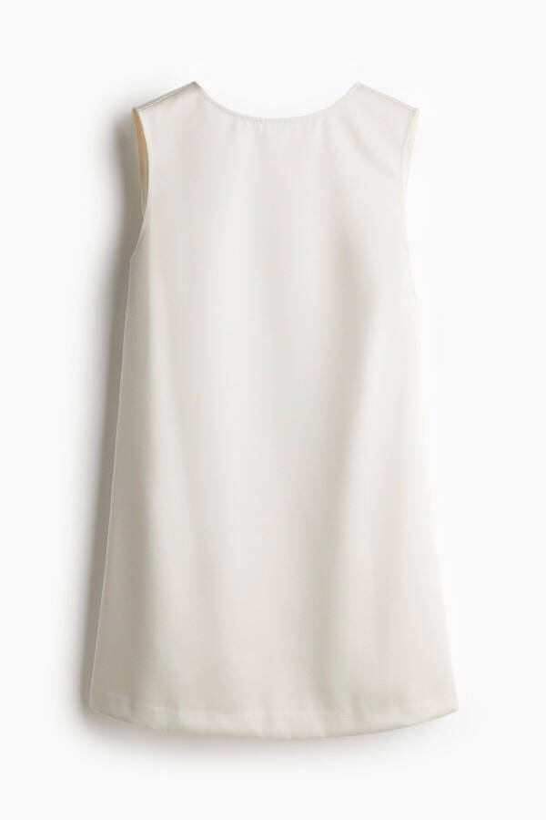 Dress with a deep back slit - 3