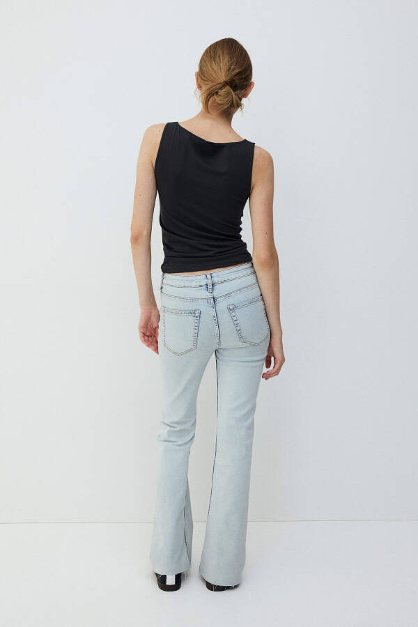 Flared High Rise Jeans - 5