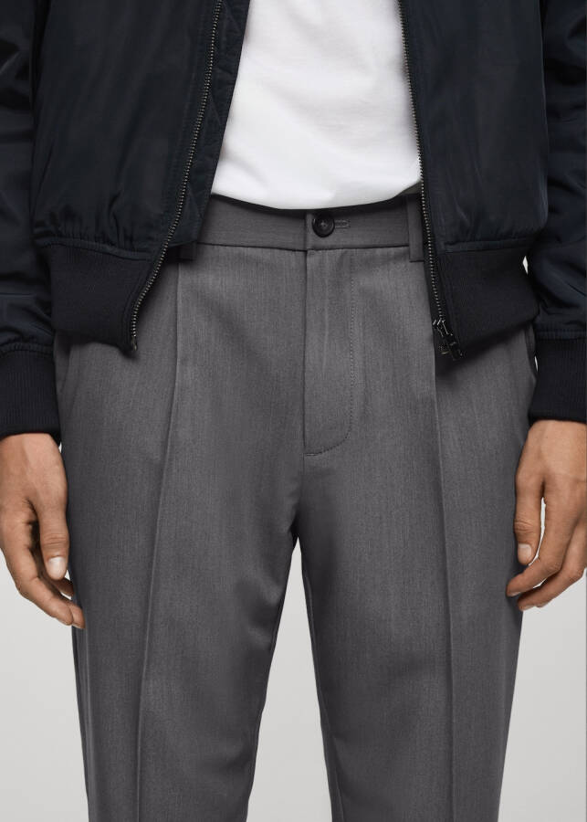 Flowing pleated, regular fit gray pants. - 46