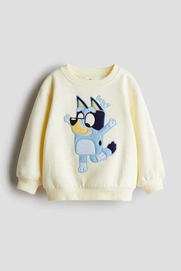 Girl's blue patterned sweatshirt - 1