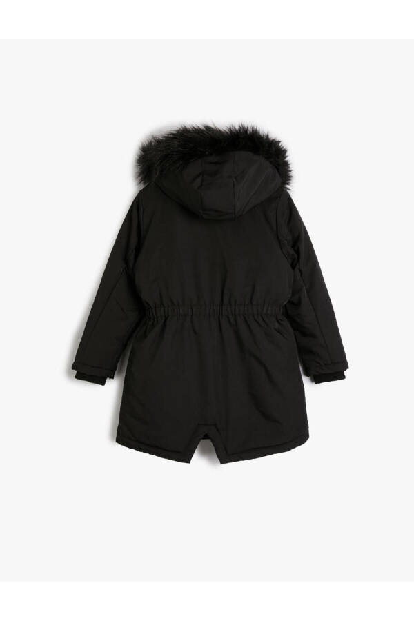 Girls' long puffer coat with fur detail pockets. - 2