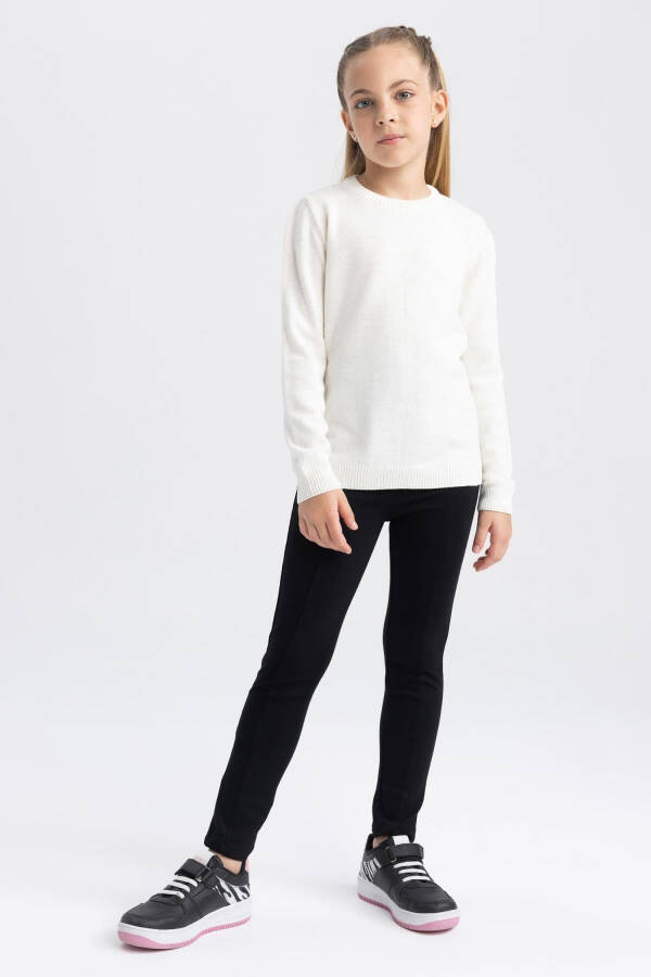 Girl's white polo school sweater. - 2