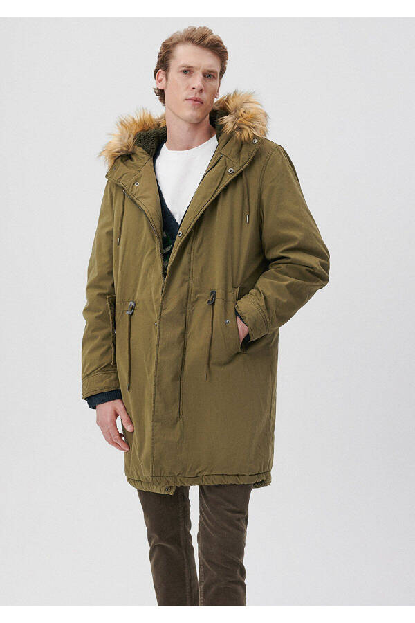 Green, fur-trimmed, oversized long parka. 0110108-29754 - 1