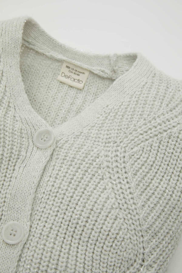 Green V-neck, glitter button closure knitted cardigan. (A4081a524au) - 2