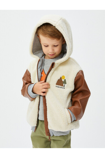 Hooded plush jacket with embroidered faux leather details. - 2