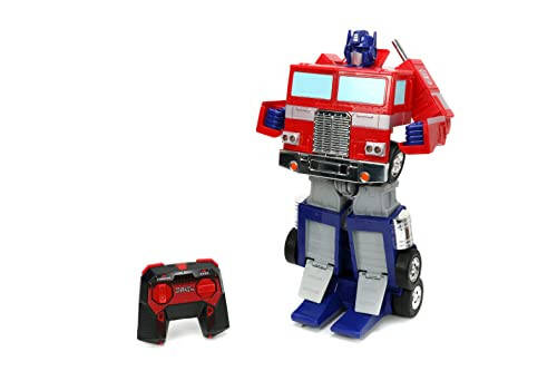 Jada Toys - Transformers Optimus Prime Konvertatsiya qiluvchi RC Avtomobil - Bolalar o'yinchoq sovg'asi - Yuk mashinasidan robotga o'zgarish - Chiroqlar va tovushlar - To'liq funksiyali masofadan boshqarish pulti - 13' Uzun - 12