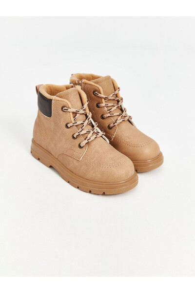 Laced baby boots for boys. - 1