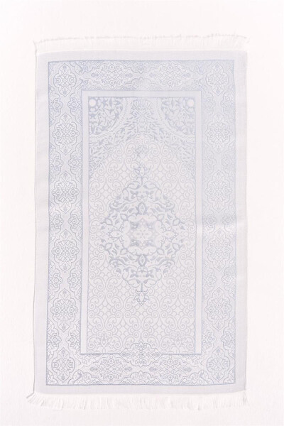 Light blue, patterned prayer rug. - 1