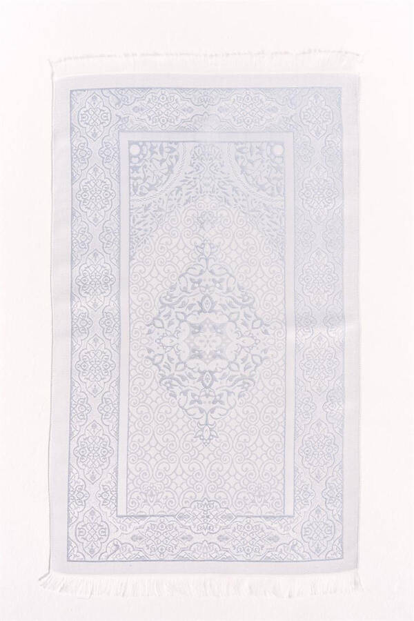 Light blue, patterned prayer rug. - 1