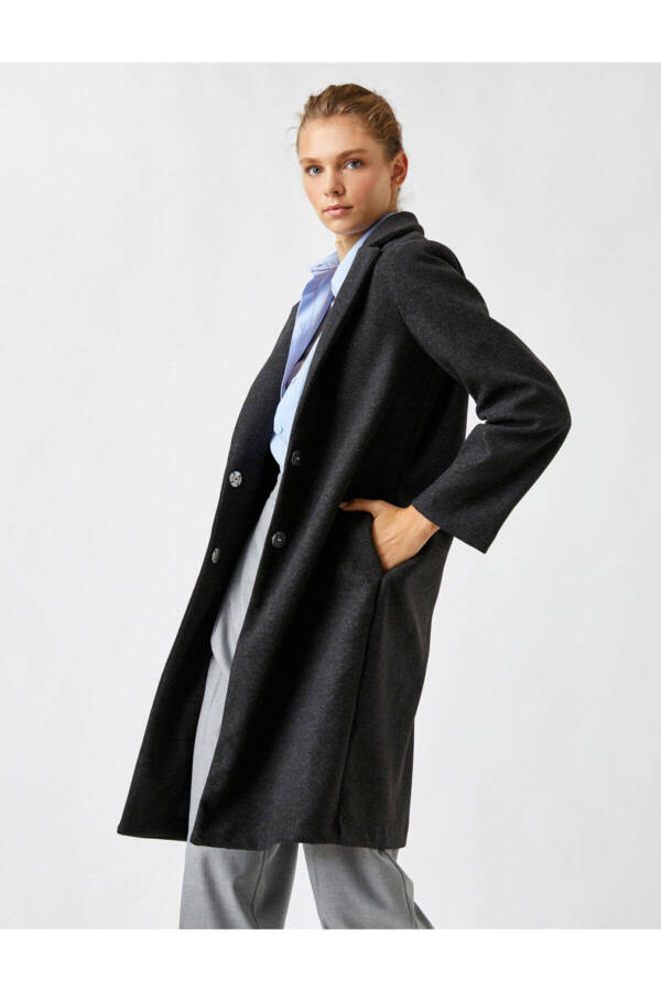 Long coat with bright stone buttons and a layered collar - 2