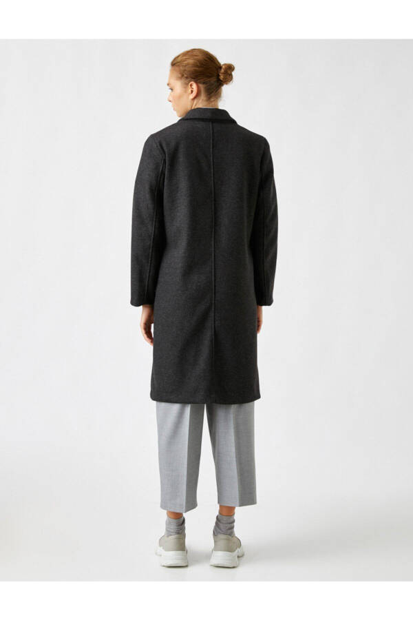 Long coat with bright stone buttons and a layered collar - 4